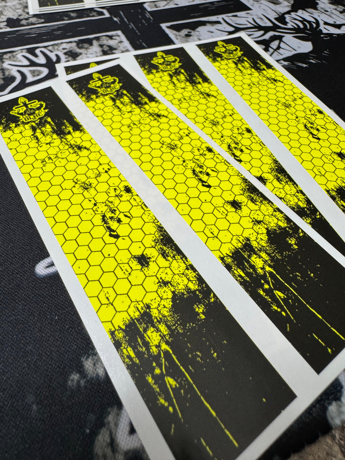 TOXIC HIVE cosmetic packaging, black with silver accents, featuring a stylized honeycomb design.