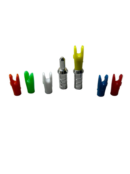 Assortment of 5mm pin bushings and nocks in red, green, white, yellow, blue, and red.
