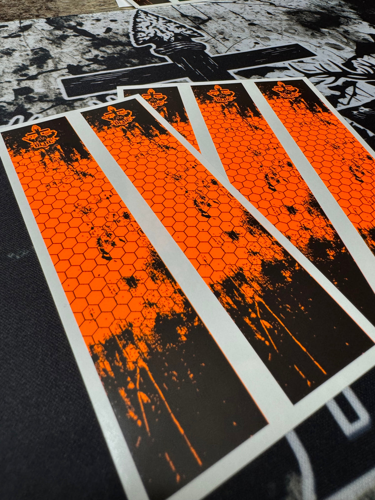 TOXIC HIVE product packaging: black box with vibrant, stylized insect graphics in neon green and pink.