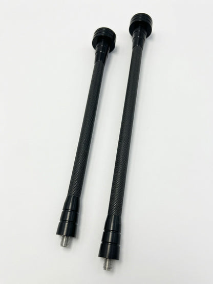 Two black OryX Micro Pro stabilizers, featuring knurled shafts and threaded ends.