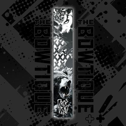 Black and white arrow wraps featuring fierce wildlife art (wolf, owl) with "The Bowtique" branding.