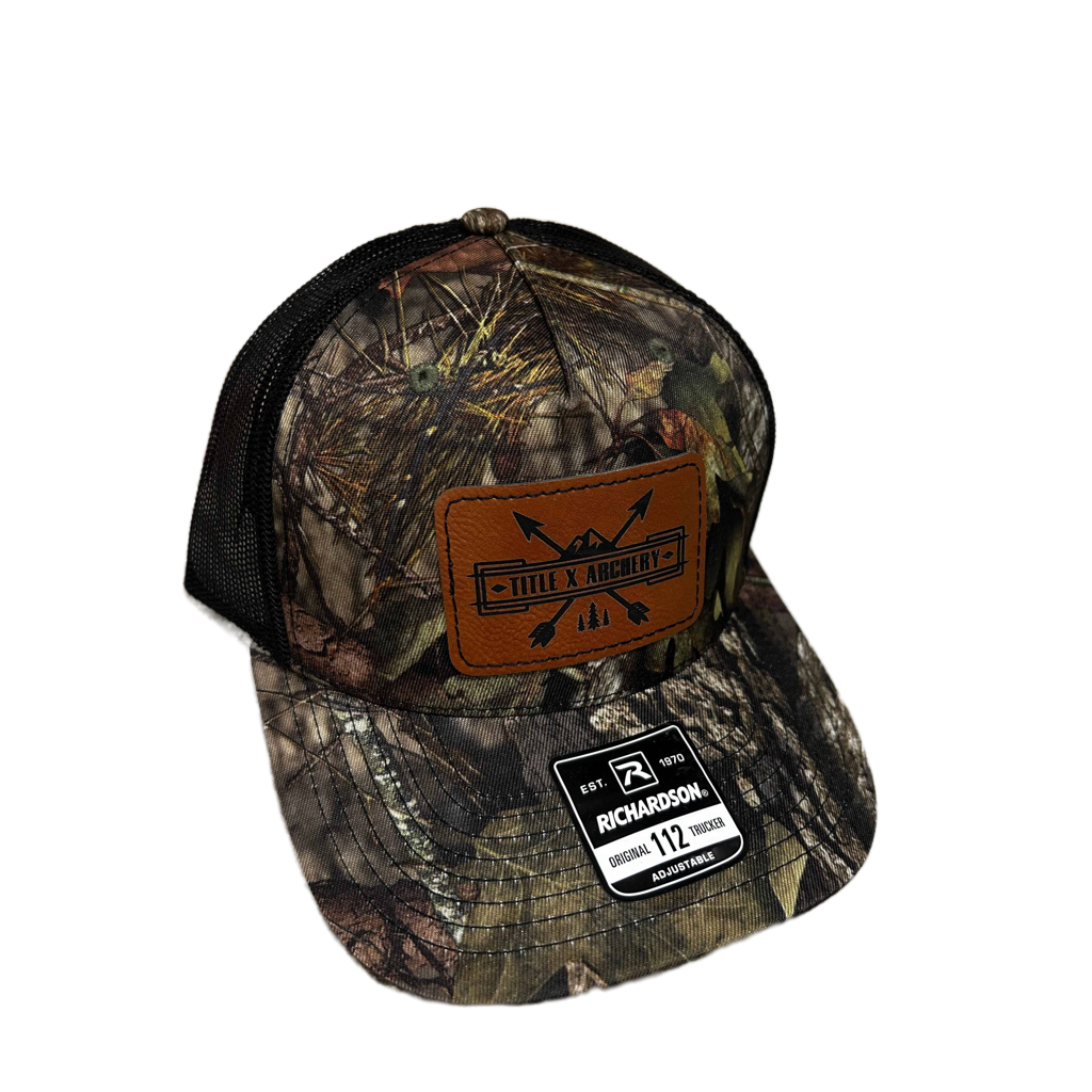 Camouflage baseball cap with leather patch and Richardson logo on a white background