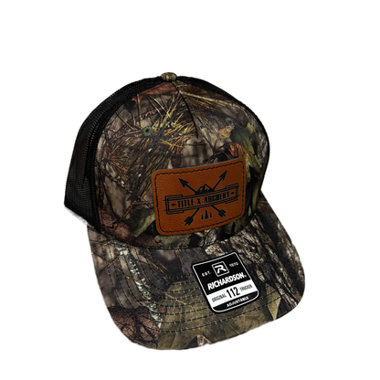 Camouflage baseball cap with leather patch and Richardson logo on a white background