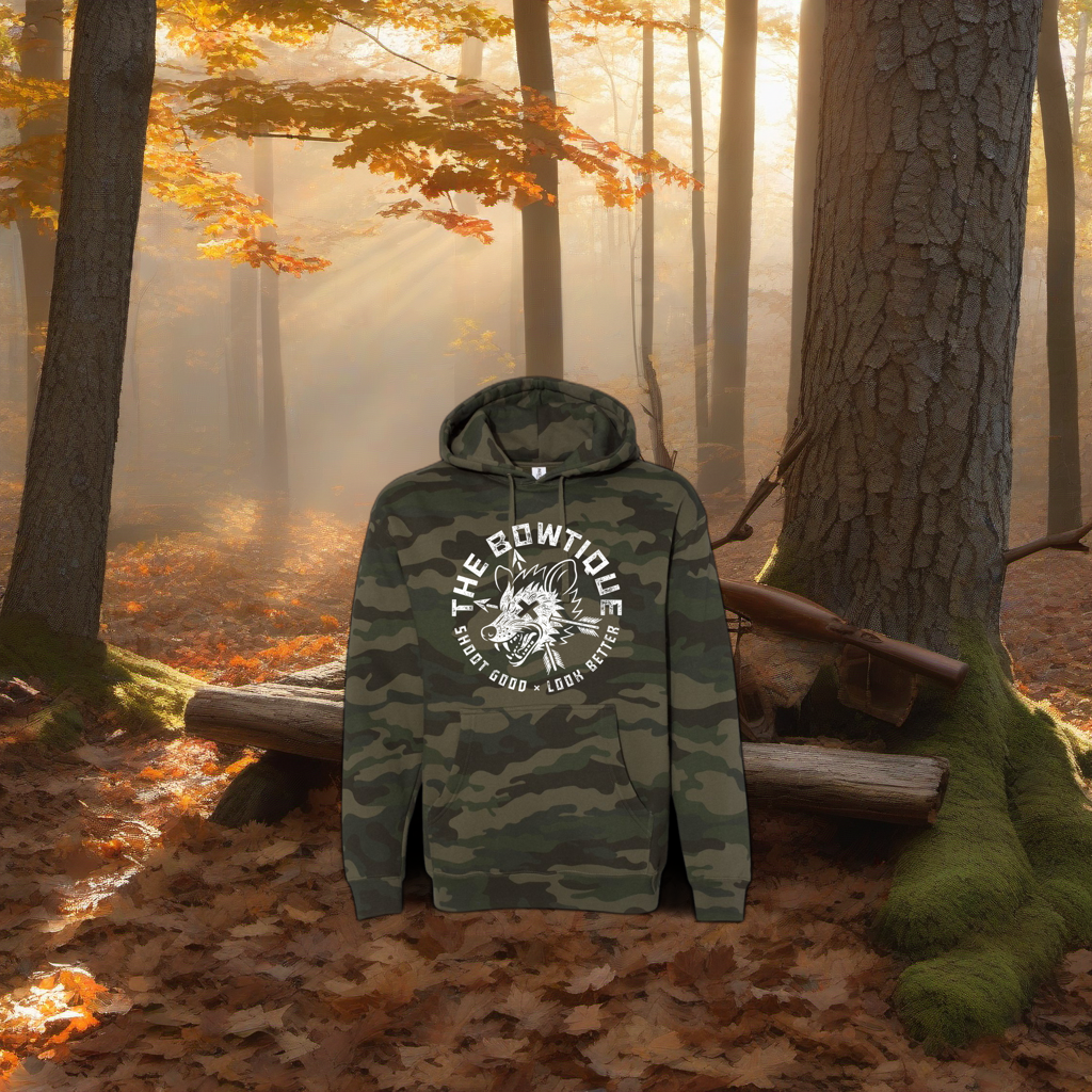 Camo hoodie on a wooden treestand overlooking a misty, dawn-lit hardwood timber ridge. | titlex-scene-whitetail-treestand