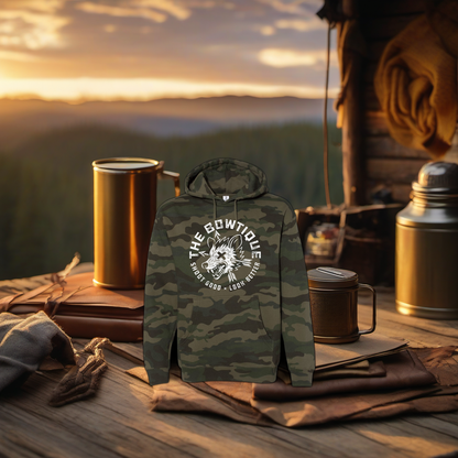 Camo hoodie on rustic table at golden hour camp scene, perfect Father's Day gift. | titlex-scene-fathers-day
