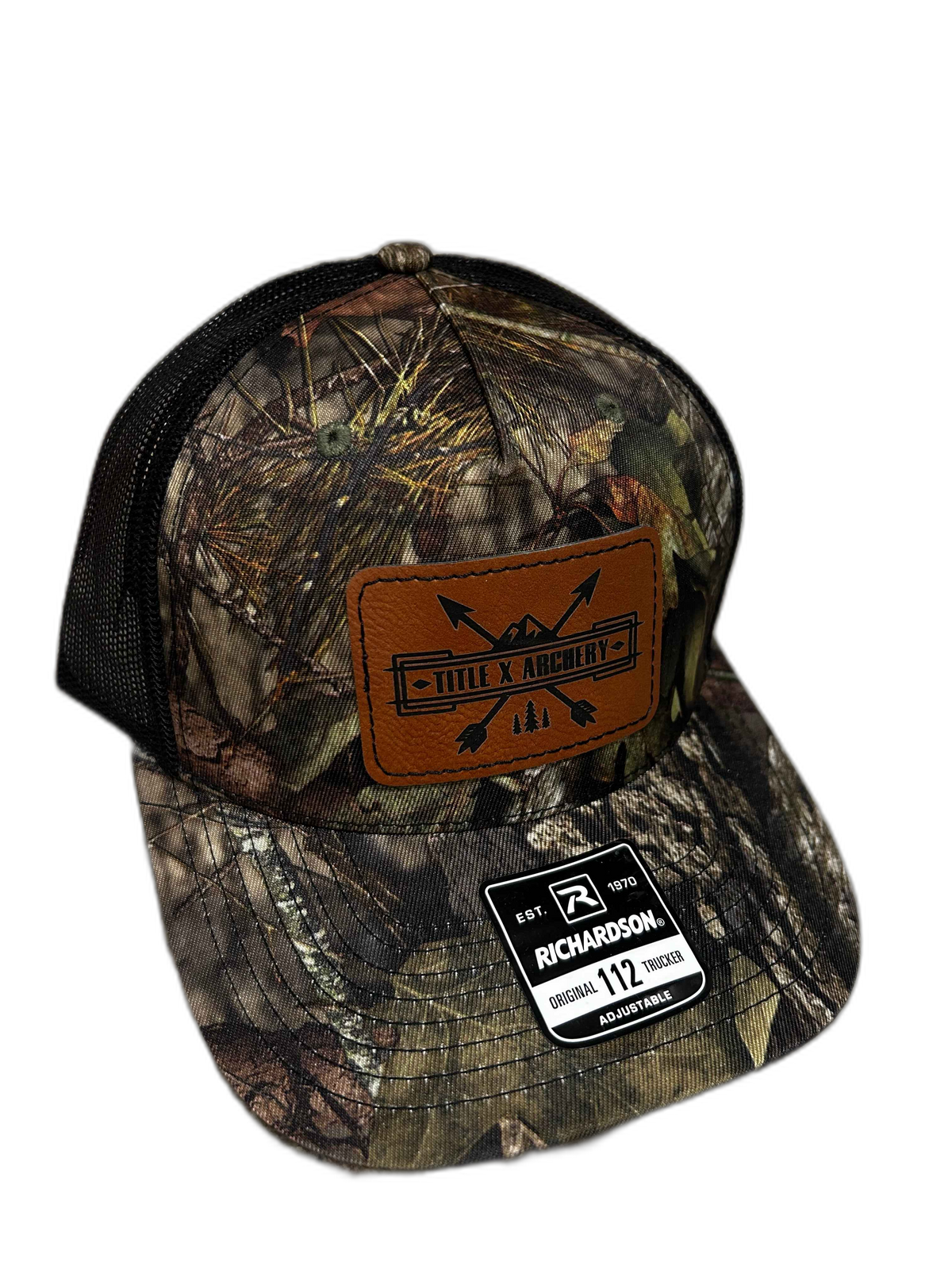 Camo baseball cap featuring Title X Archery and Richardson 112 patches. | titlex-cutout