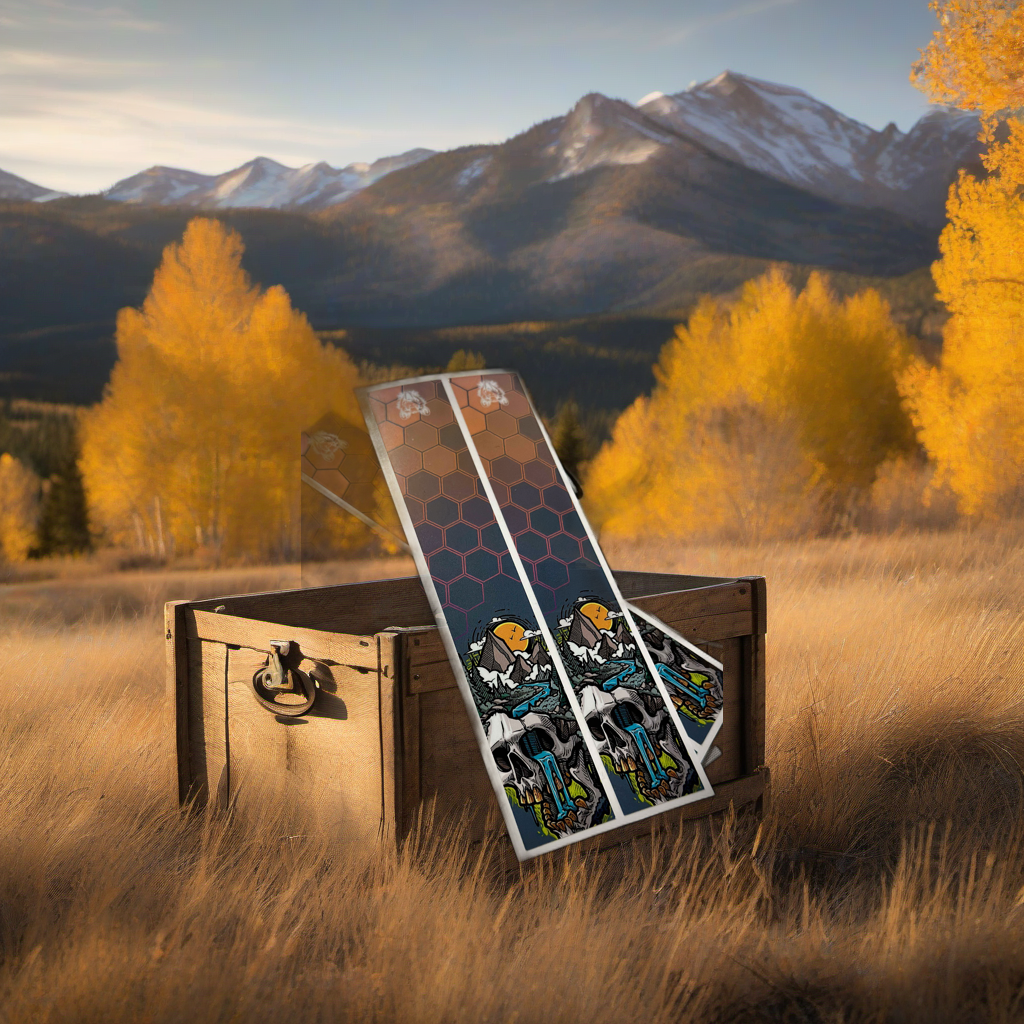 Treasure Island Arrow Wraps on weathered wood with golden aspens and mountains at sunset. | titlex-scene-western-elk