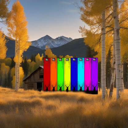 Arrow wraps on weathered wood, set against golden aspens and mountains at sunset. | titlex-scene-western-elk